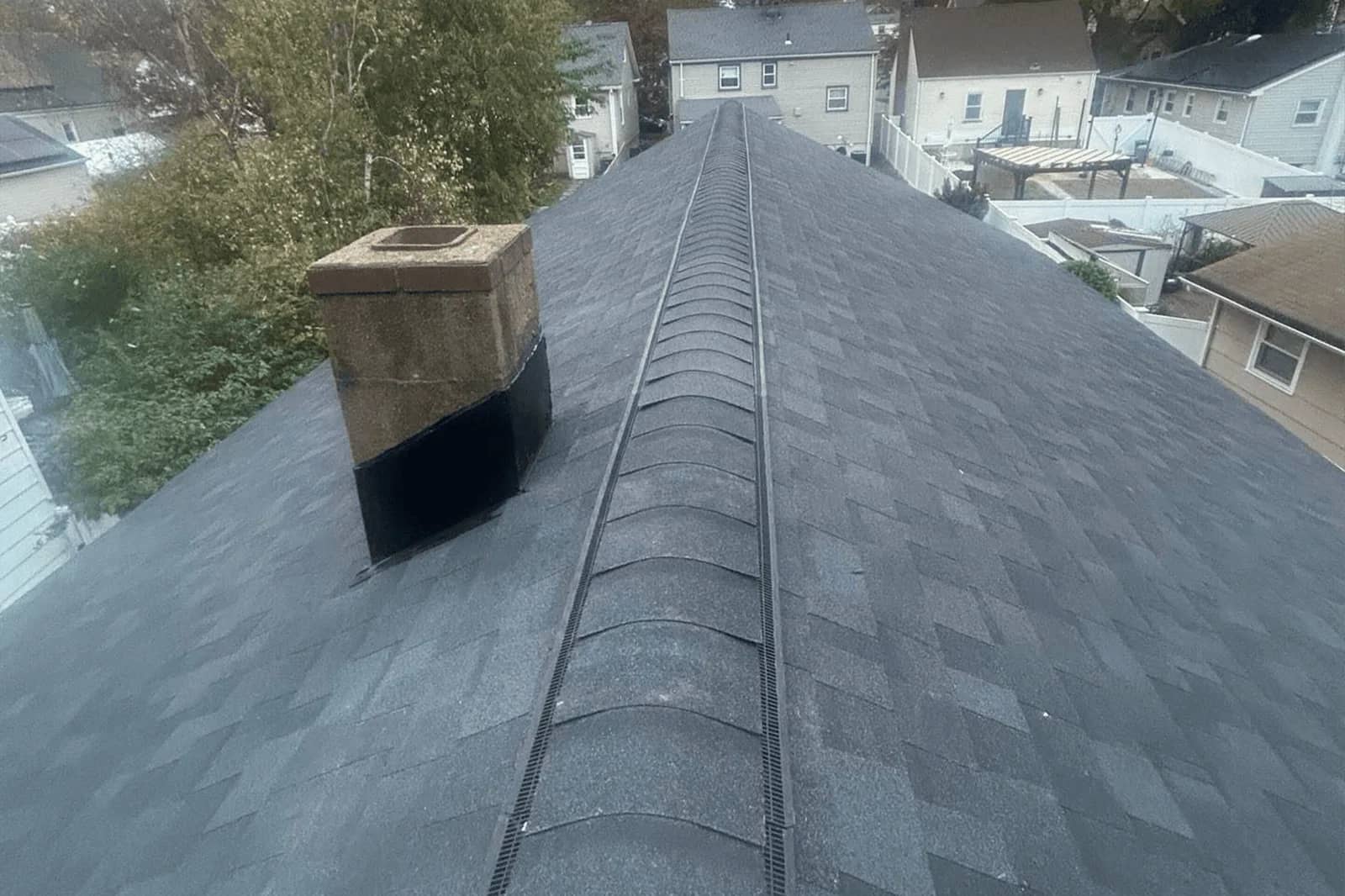 Vesta asphalt shingle roof installation with ridge vent