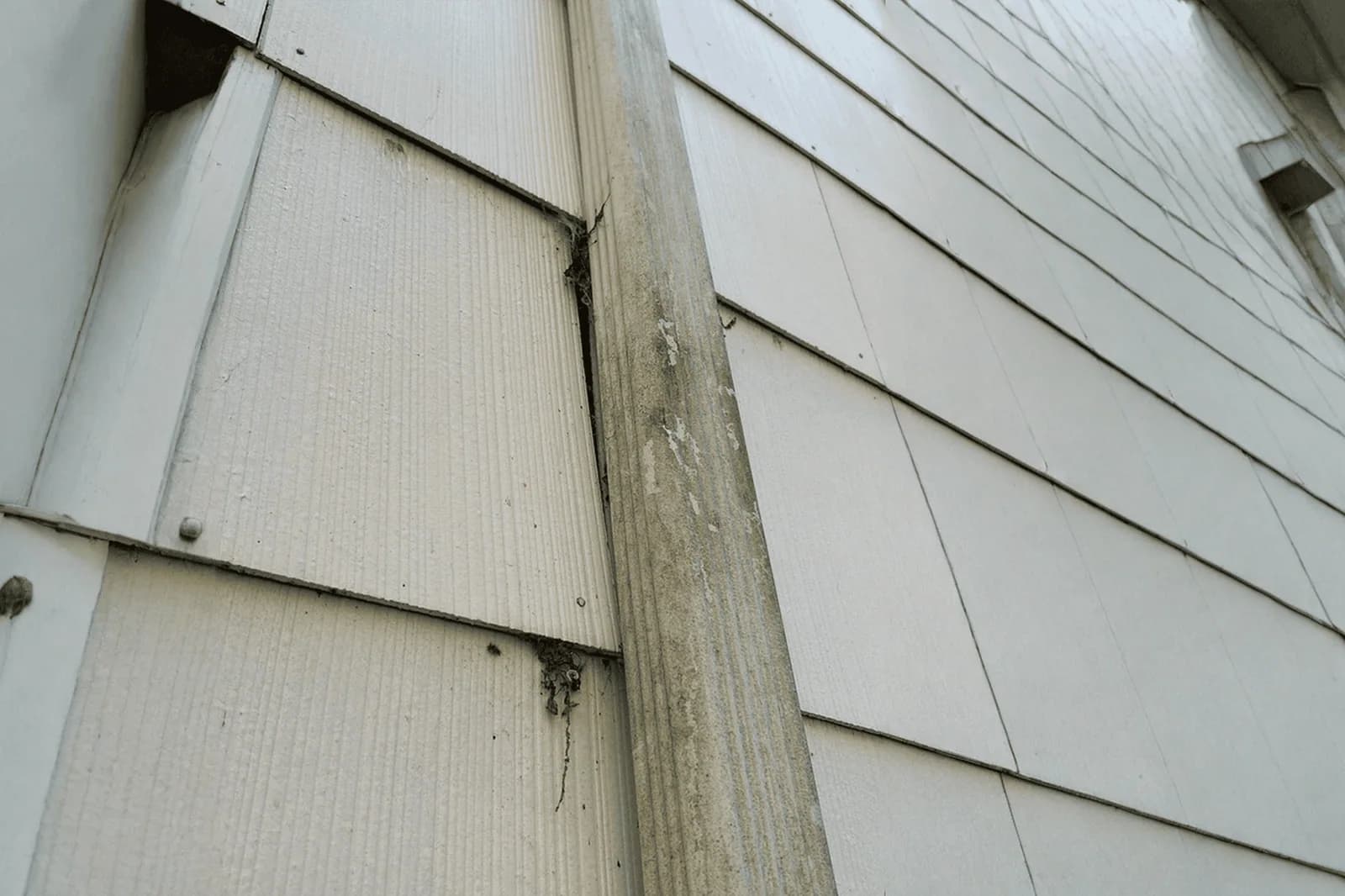 Weathered exterior trim and siding with an open joint