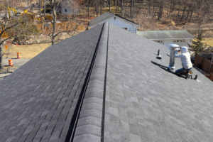 Roof underlayment installation during residential roofing project in New Jersey by Vesta Remodeling