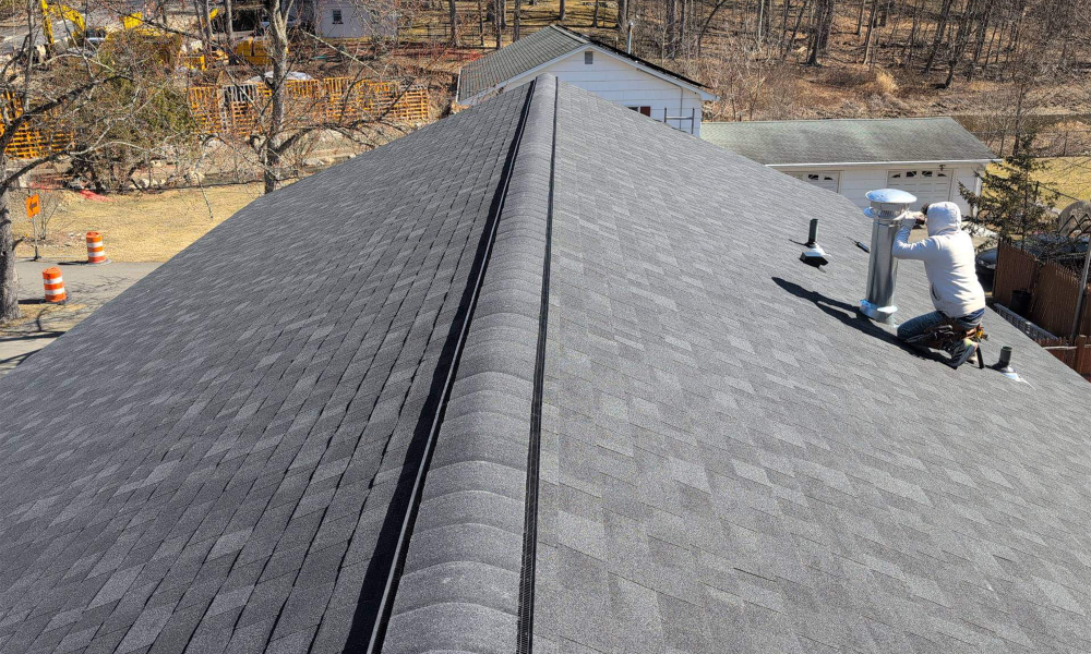 Roof underlayment installation during residential roofing project in New Jersey by Vesta Remodeling