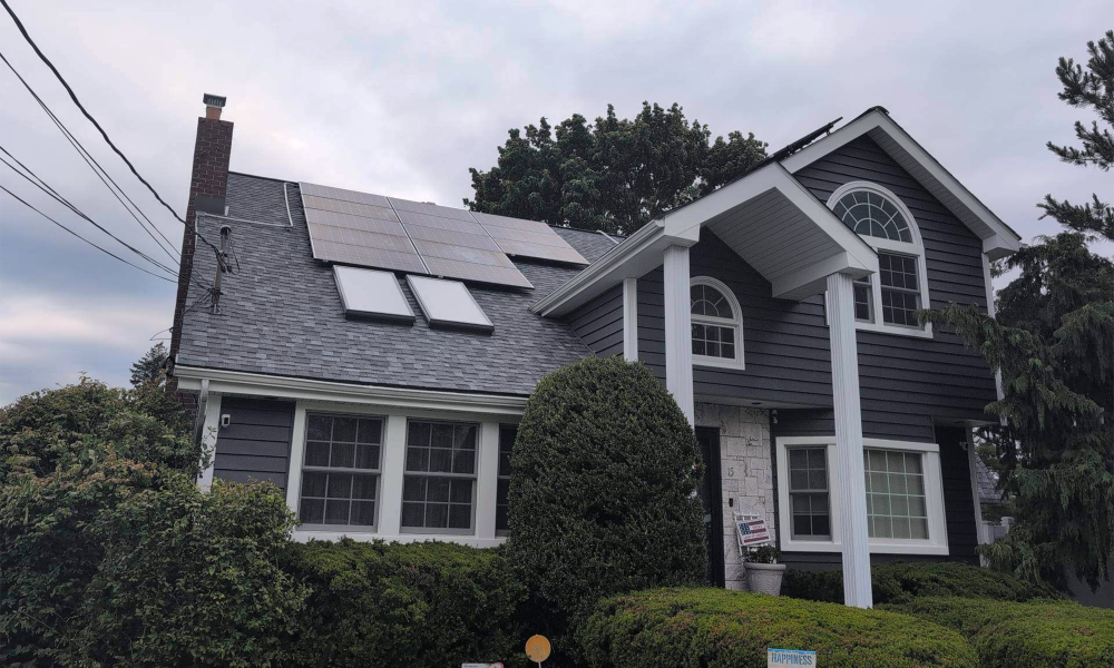 Completed exterior home remodeling project in New Jersey featuring new siding windows and roofing by Vesta Remodeling