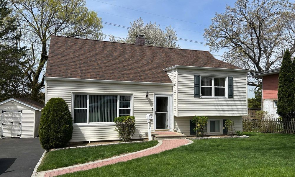 Completed residential roofing project in New Jersey featuring new asphalt shingle roof by Vesta Remodeling