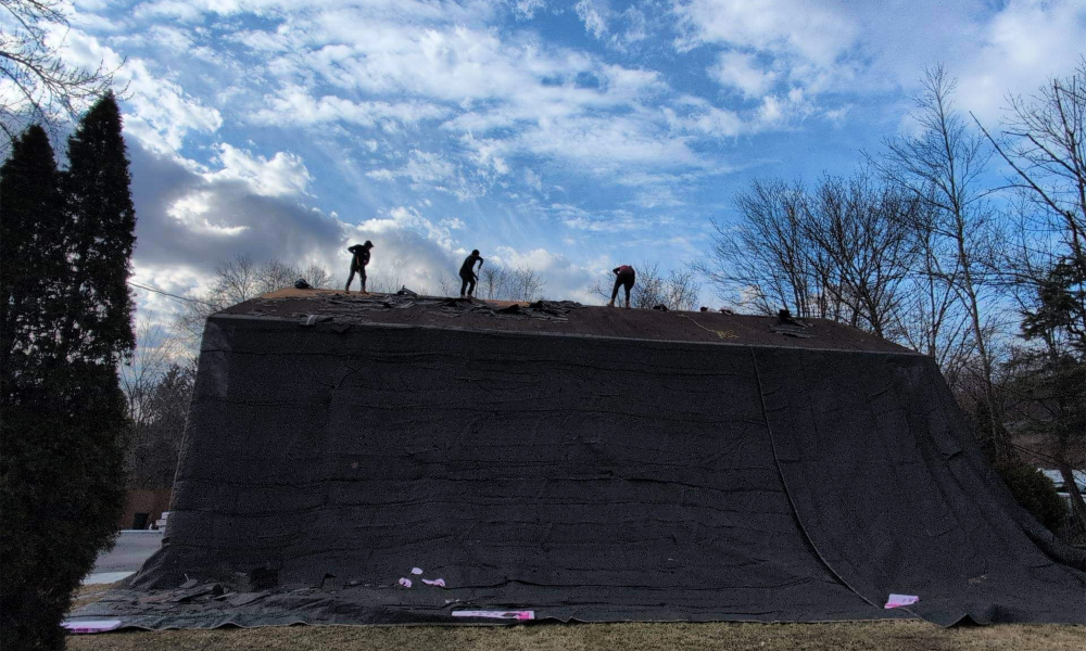 Residential roof tear off and preparation stage during roofing project in New Jersey by Vesta Remodeling