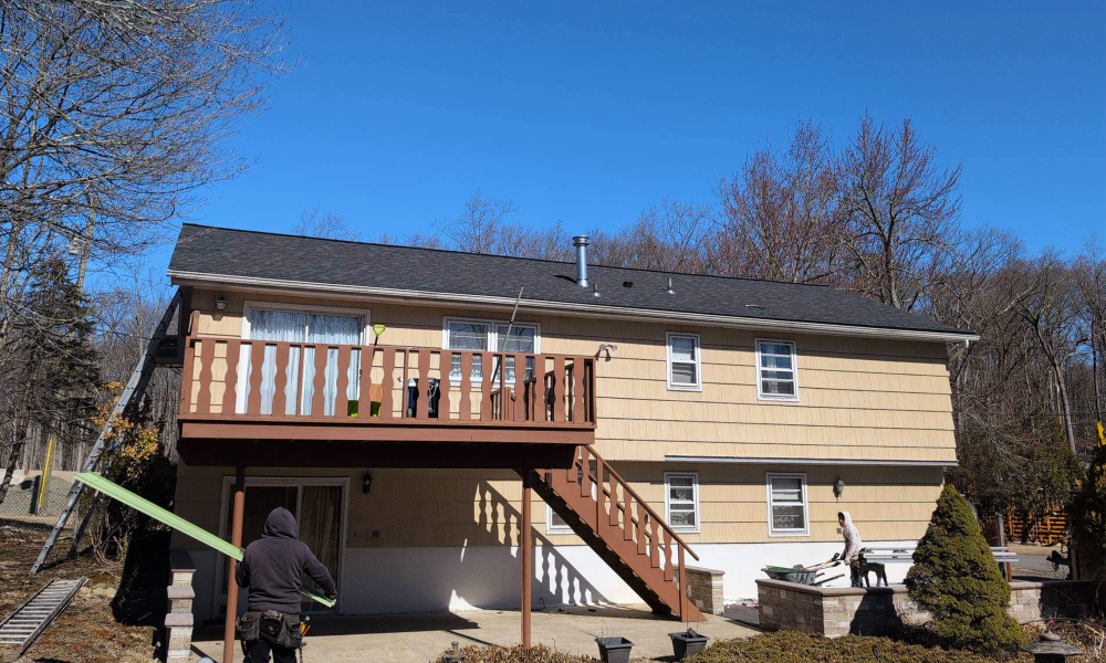 Completed residential roofing project on a two story home in New Jersey by Vesta Remodeling